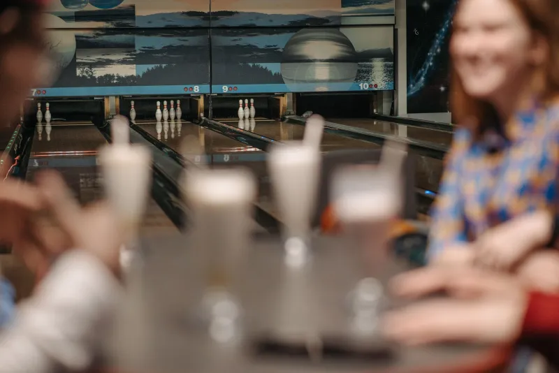 Out of the House and Into the Vibe: Why Bowling Alleys, Dive Bars, and Coffee Shops Are Winning the Social Game
